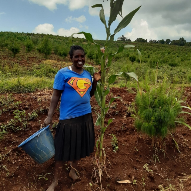 Purity Chelimo plants maize and puts trees in between